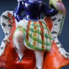 Load image into Gallery viewer, Antique STAFFORDSHIRE Figurine. Little Child in Kilt Standing on a Chair. A Pheasant Perching on Chair Back
