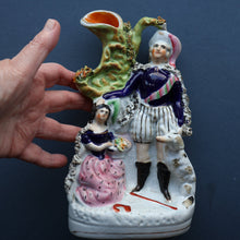 Load image into Gallery viewer, Rarer ANTIQUE Staffordshire Figurine / Spill Vase Featuring a Man and Woman with Dog Standing Beside a Tree
