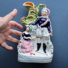 Load image into Gallery viewer, Rarer ANTIQUE Staffordshire Figurine / Spill Vase Featuring a Man and Woman with Dog Standing Beside a Tree
