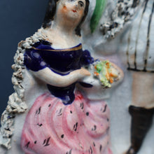 Load image into Gallery viewer, Rarer ANTIQUE Staffordshire Figurine / Spill Vase Featuring a Man and Woman with Dog Standing Beside a Tree
