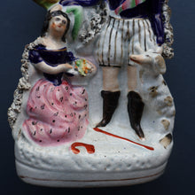 Load image into Gallery viewer, Rarer ANTIQUE Staffordshire Figurine / Spill Vase Featuring a Man and Woman with Dog Standing Beside a Tree
