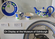 Load image into Gallery viewer, SCOTTISH POTTERY. 1920s Mak Merry Hand-Painted Shallow Bowl. Blue Background with Prunus Flowers. 7 3/4 inches
