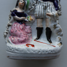 Load image into Gallery viewer, Rarer ANTIQUE Staffordshire Figurine / Spill Vase Featuring a Man and Woman with Dog Standing Beside a Tree
