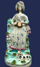 Load image into Gallery viewer, Antique Victorian Staffordshire Figurine. Lady Playing a Concertina with Lamb at her Feet
