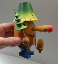 Load image into Gallery viewer, Vintage German Erzgebirge Wooden Handmade Incense Smoker: Strange Cartoon Woodsman with Christmas Tree
