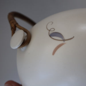 1950’s Poole Twintone Biscuit Barrel with Stylised Floral TURDIANA Pattern. Designed by Ruth Pavely