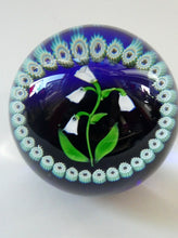 Load image into Gallery viewer, Vintage Scottish Paperweight . Lily of the Valley (MAY) White Lampwork Flower on Dark Blue Base
