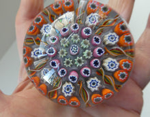 Load image into Gallery viewer, 1970s Scottish PERTHSHIRE Paperweight. Pale Lilac Ground. 9 Half Spokes &amp; Millefiori Canes
