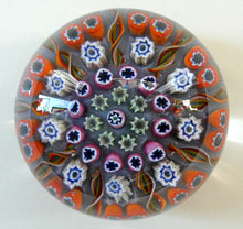 Load image into Gallery viewer, 1970s Scottish PERTHSHIRE Paperweight. Pale Lilac Ground. 9 Half Spokes &amp; Millefiori Canes
