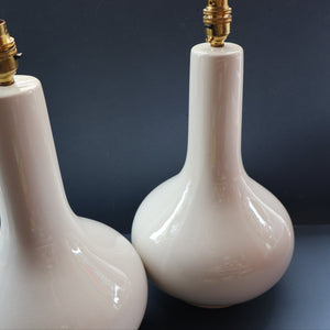 MID-CENTURY:  Highly Collectable. Matched Pair of White CASA PUPO Bulbous Ceramic Lamps. Each with stamp on base