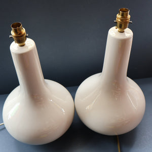 MID-CENTURY:  Highly Collectable. Matched Pair of White CASA PUPO Bulbous Ceramic Lamps. Each with stamp on base