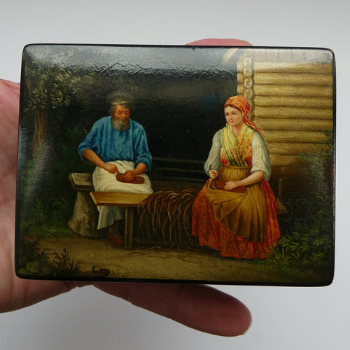 19th Century Russian Lacquer Box with Painted Lid Showing Couple Making Bast Shoes. Folk Art