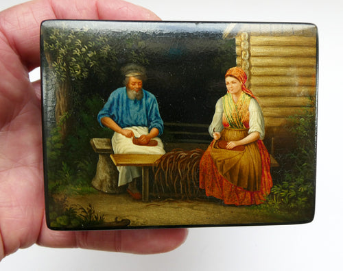 19th Century Russian Lacquer Box with Painted Lid Showing Couple Making Bast Shoes. Folk Art