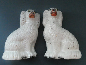 Staffordshire Dogs Chimney Spaniels / Wally Dugs. 8 1/2 inches. ANTIQUE PAIR with painted yellow eyes; c1880