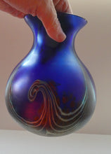 Load image into Gallery viewer, Vintage 1980s OKRA Style Cobalt Blue Glass Vase with Metallic and Red Lustre Swirls
