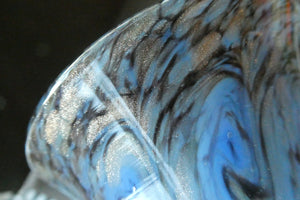 SCOTTISH GLASS. MONART Scottish Art Glass Vase. Thistle Shape. Mottled Powder Blue and Black Flecks & Gold Aventurine at the Rim. 4 3/4 inches high