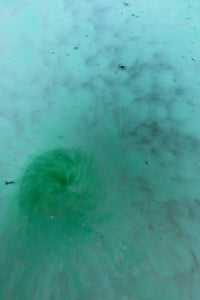 SCOTTISH GLASS. MONART Scottish Art Glass Vase. QC Shape. Mottled Aqua Green Changing to Blue at the Rim. 9 3/4 inches high