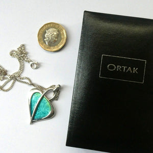 SCOTTISH SILVER. Pre-Loved Silver and Purple Enamel ORTAK LEAH Pendant. BOXED