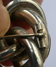 Load image into Gallery viewer, 1880s SCOTTISH SILVER: Victorian Lover&#39;s Knot Brooch with Inset Specimen Agates
