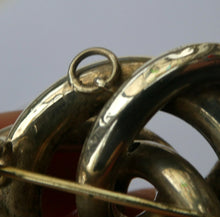 Load image into Gallery viewer, 1880s SCOTTISH SILVER: Victorian Lover&#39;s Knot Brooch with Inset Specimen Agates
