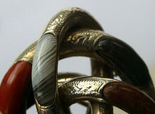 Load image into Gallery viewer, 1880s SCOTTISH SILVER: Victorian Lover&#39;s Knot Brooch with Inset Specimen Agates
