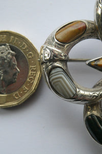 1880s SCOTTISH SILVER: Victorian Quatrefoil Shape and Raised Star Brooch with Inset Specimen Agates