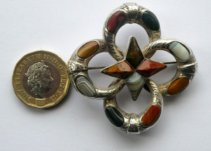 1880s SCOTTISH SILVER: Victorian Quatrefoil Shape and Raised Star Brooch with Inset Specimen Agates