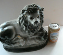 Load image into Gallery viewer, Large ANTIQUE Victorian Staffordshire GREY Recumbent Lion with Glass Eyes. 11 inches in length
