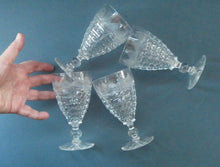 Load image into Gallery viewer, 1930s ART DECO Stuart Crystal FOUR Wine Glasses. With Cut Oval Facets and Engraved Fan Fringe Pattern. Height 5 3/8 inches
