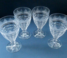 Load image into Gallery viewer, 1930s ART DECO Stuart Crystal FOUR Wine Glasses. With Cut Oval Facets and Engraved Fan Fringe Pattern. Height 5 3/8 inches
