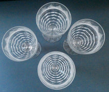 Load image into Gallery viewer, 1930s ART DECO Stuart Crystal FOUR Wine Glasses. With Cut Oval Facets and Engraved Fan Fringe Pattern. Height 5 3/8 inches
