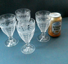 Load image into Gallery viewer, 1930s ART DECO Stuart Crystal FOUR Wine Glasses. With Cut Oval Facets and Engraved Fan Fringe Pattern. Height 5 3/8 inches
