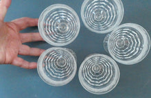 Load image into Gallery viewer, 1930s ART DECO Stuart Crystal FIVE Wine Glasses. With Cut Oval Facets and Engraved Fan Fringe Pattern. Height 4 1/2 inches
