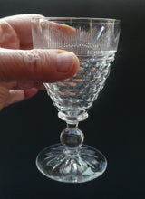 Load image into Gallery viewer, 1930s ART DECO Stuart Crystal FIVE Wine Glasses. With Cut Oval Facets and Engraved Fan Fringe Pattern. Height 4 1/2 inches
