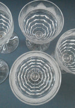 Load image into Gallery viewer, 1930s ART DECO Stuart Crystal FIVE Wine Glasses. With Cut Oval Facets and Engraved Fan Fringe Pattern. Height 4 1/2 inches
