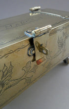 Load image into Gallery viewer, Arts and Crafts Brass Casket with Engraved Wyvern Decoration, Strapwork Bands &amp; Claw Feet
