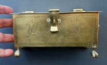 Load image into Gallery viewer, Arts and Crafts Brass Casket with Engraved Wyvern Decoration, Strapwork Bands &amp; Claw Feet
