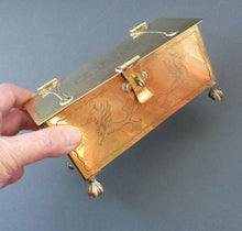 Load image into Gallery viewer, Arts and Crafts Brass Casket with Engraved Wyvern Decoration, Strapwork Bands &amp; Claw Feet
