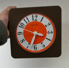 Load image into Gallery viewer, Made in Ireland Wall Clock Hanson or Hansco. Vintage Orange and Brown Plastic
