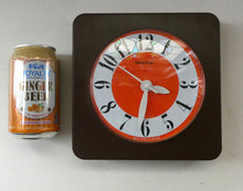 Load image into Gallery viewer, Made in Ireland Wall Clock Hanson or Hansco. Vintage Orange and Brown Plastic
