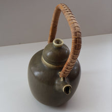 Load image into Gallery viewer, Highly Collectable 1960s DANISH ART POTTERY. Teapot with Wicker Handle. Designed by Frode Blichfeldt Bahnsen for Palshus
