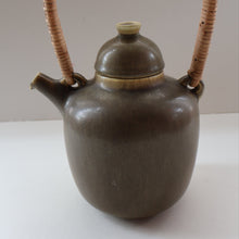 Load image into Gallery viewer, Highly Collectable 1960s DANISH ART POTTERY. Teapot with Wicker Handle. Designed by Frode Blichfeldt Bahnsen for Palshus
