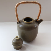 Load image into Gallery viewer, Highly Collectable 1960s DANISH ART POTTERY. Teapot with Wicker Handle. Designed by Frode Blichfeldt Bahnsen for Palshus
