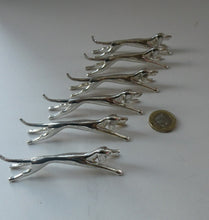 Load image into Gallery viewer, Collectable Vintage Set of SIX Silver Plate Knife Rests in the form of Running Dogs
