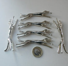Load image into Gallery viewer, Collectable Vintage Set of SIX Silver Plate Knife Rests in the form of Running Dogs
