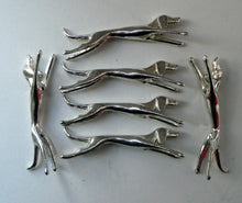 Load image into Gallery viewer, Collectable Vintage Set of SIX Silver Plate Knife Rests in the form of Running Dogs
