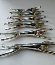 Load image into Gallery viewer, Collectable Vintage Set of SIX Silver Plate Knife Rests in the form of Running Dogs
