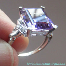 Load image into Gallery viewer, Pretty 9 CT White Gold Ring Set with an Emerald Cut Amethyst &amp; flanked with decorative diamond chips. Size N 1/2

