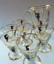 Load image into Gallery viewer, Set of SIX 1950s Cocktail Glasses Decorated with Seahorses. Plus Tall Glass Mixing Jug

