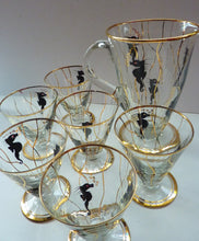 Load image into Gallery viewer, Set of SIX 1950s Cocktail Glasses Decorated with Seahorses. Plus Tall Glass Mixing Jug
